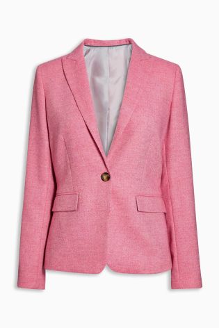 40% wool - probably a looser fit